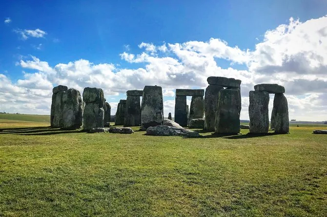 Stonehenge on a bright day with a few visitors